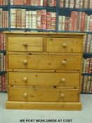 A pine chest of two over three drawers (W91 x D42 x H91cm)