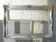 A large silver picture frame (overall size 123 x 183cm)