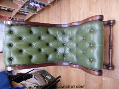 A Chesterfield leather and mahogany nursing chair