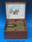 A symphonium disc musical box playing 6in discs on a 32-tooth comb (serial number 163) with 18