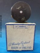 A Hardy Brothers 3 3/8ths diameter 'Perfect' fly fishing reel in original box.