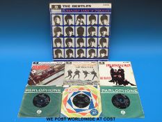 A collection of seven records by The Beatles,