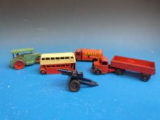 Five Dinky toys diecast model vehicles including a Dinky Supertoys Bedford lorry