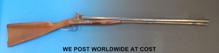 Italian side by side muzzle loading gun marked to the 28.