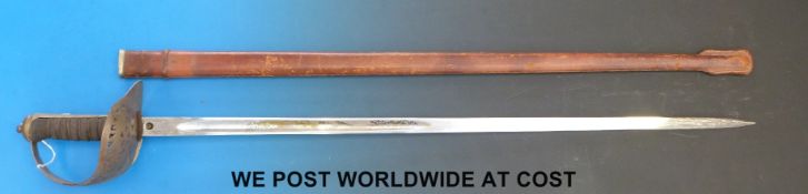 An 1897 pattern sword in leather scabbard with engraved 'Aldershot Stores,