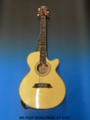 An acoustic/electric six-string Westfield guitar with cutaway body in hard case, model SF677/N.