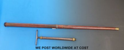 An unnamed metal walking cane air gun with turned wooden end,