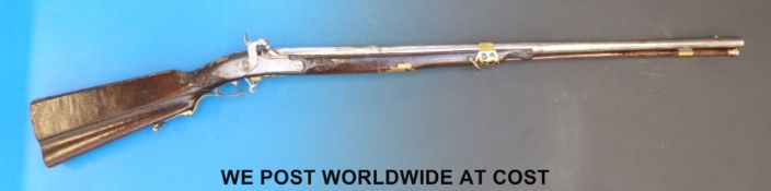 Muti Cortona 20 bore single barrelled muzzle loading hammer action gun with carved acanthus leaves