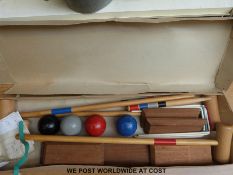 A boxed Jaques croquet set.