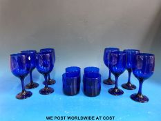 A set of eight Bristol blue wine glasses together with four matching tumblers