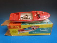 A Tri-ang battery operated speedboat together with a Scalex Boats 4155 speedboat,