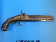 A percussion holster pistol with brass mounts, trigger guard and steel ramrod,