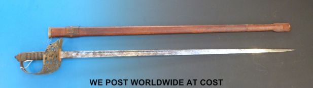 An 1895 pattern infantry officer's sword in leather sheath.