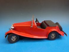 A Doepke diecast model 1954 MG convertible sports car (40cm long)