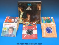 Over 80x 7” singles and EPs, and four LPs,