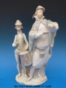 A Lladro figure Speaker and Drummer Boy