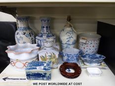A quantity of decorative blue and white and other ceramics including a tea caddy