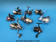 Eight fixed spool and closed face fishing reels, some boxed and unused to include Daiwa US80,