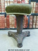 A Victorian rosewood piano stool with extending corkscrew action