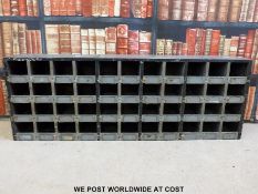 A metal military or similar style cubby hole unit (W130 x D23 x H44cm)