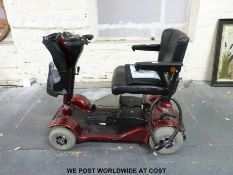 A Sterling Sapphire mobility scooter with charger