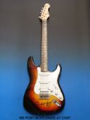 An autographed Rolling Stones guitar, signed on the body by Mick Jagger, Keith Richards,