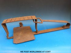 A Georgian bear/man trap, marked WC to underside, length 72 cm.