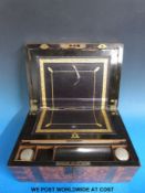 A 19thC brass bound walnut writing slope together with postcards and paperwork relating to the