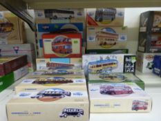 Sixteen Corgi diecast model buses including Classics, Commercials, Beatles,