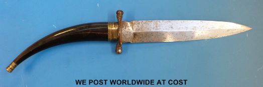 A possibly rhino horn handled dagger with Damascus blade,