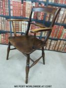 A 19thC oak and mahogany elbow chair