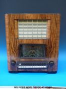 A Marconi model 878 walnut cased vintage radio in fully restored condition