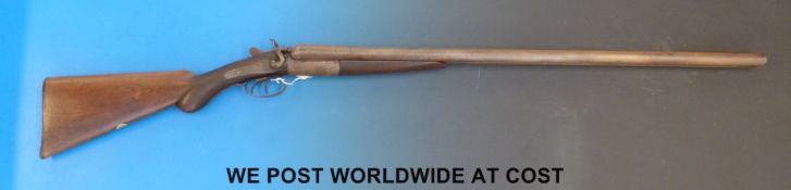 Capell 12 bore side by side shotgun with engraved birds to the locks, dolphin hammers,