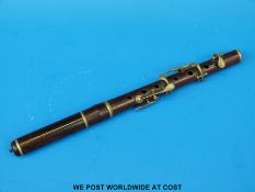 A late 19thC nickel-mounted rosewood fife with six keys and tuning slide (30cm long)
