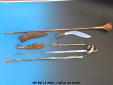 A WW2 Italian cavalry officers sword together with a decorative dagger, kukri,