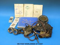 A Type 8 Spitfire compass together with a pilot's helmet and goggles and a collection of inter-war