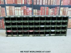 A metal military or similar style cubby hole unit (W130 x D23 x H44cm)