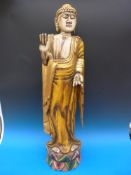 A carved Indian figure (height 99cm)