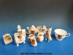 A collection of Carlton crested ware, all for Northleach, to include dog, cat,