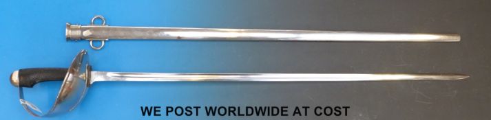 A replica 1908 Wilkinson of Pall Mall pattern cavalry trooper's sword in sheath.