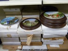 A very large quantity of collectors plates and cups by Spode, Royal Worcester, Doulton etc.