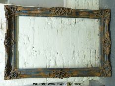 A rust effect large picture frame (overall size 123 x 183cm)