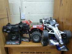 Two F1 style radio controlled cars and one other