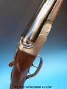 BSA 12-bore side-by-side shotgun with chequered semi-pistol grip and 28