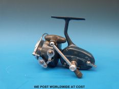 A Mitchell 440A fixed spool fishing reel in soft case (possibly unused).