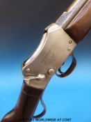 WW Greeener 12-bore Martini-Henry action shotgun with Greener's GP Gun to one side and WW Greener
