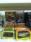 Seventeen Dinky and Corgi diecast model buses and a Corgi London taxi 425 (all in original boxes)