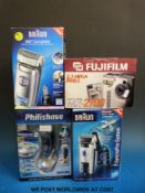 A boxed Braun 360° complete electric razor, a further Braun electric razor,