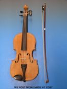 A 20thC anonymous cased 3/4 violin inlaid boxwood purfling to table, in unvarnished/oiled finish,