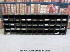 A metal military or similar style cubby hole unit (W130 x D23 x H44cm)